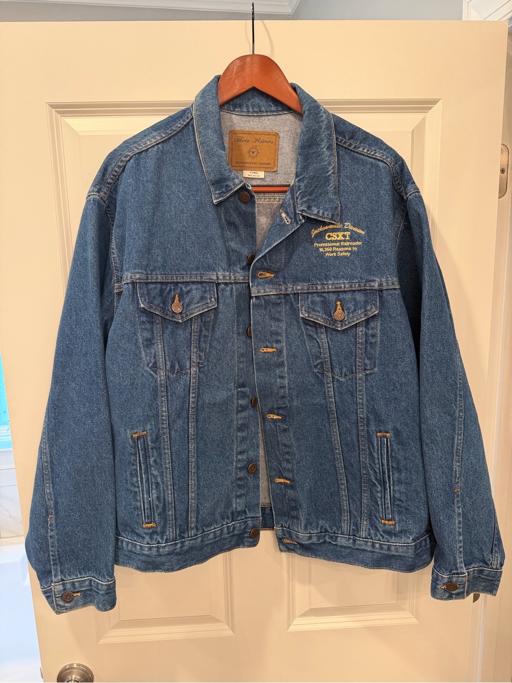 Blue Denim Trucker Jacket with Embroidered Chest Detail